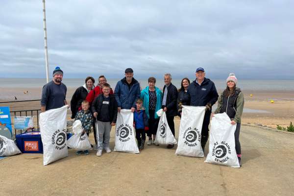 Searles Leisure Resort Staff and Owners participating in a beach clean with Surfers Against Sewage